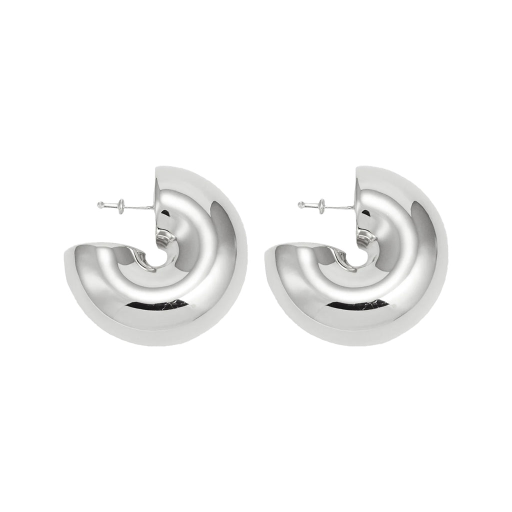 The Beam stud earrings in silver colour from the brand UNCOMMON MATTERS